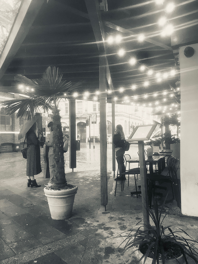 Restaurants in a rainy Flat Iron Square