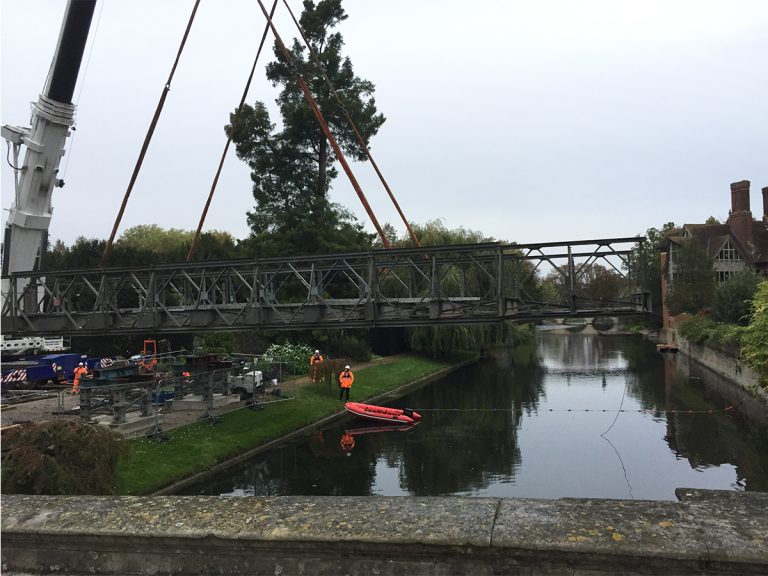 Installation of the temporary bridge across the River Cam to establish site access for Clare College, the start of works on the new construction.