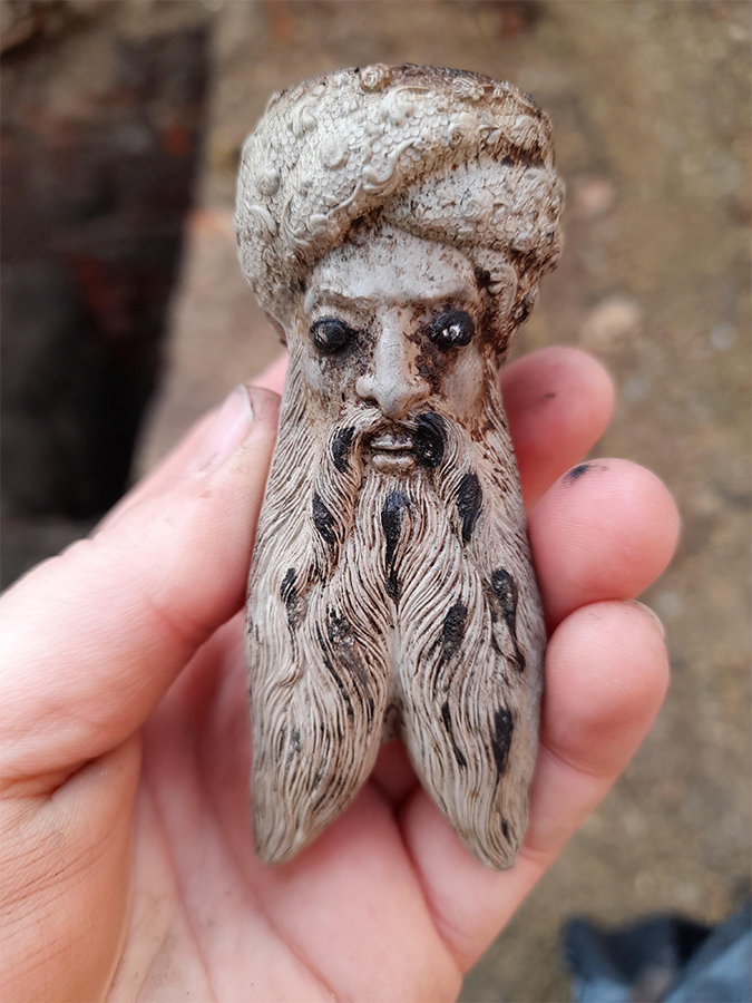 Excavations at Clare College, Cambridge uncovered a number of interesting artefacts, including this pipe shaped like a persons head.