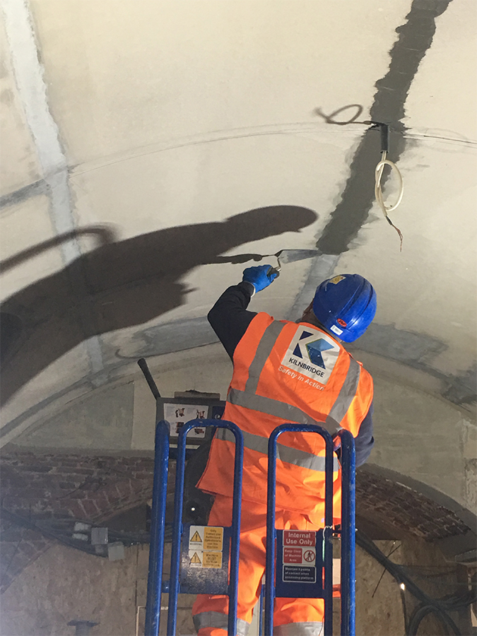 Kilnbridge worker repairing vault