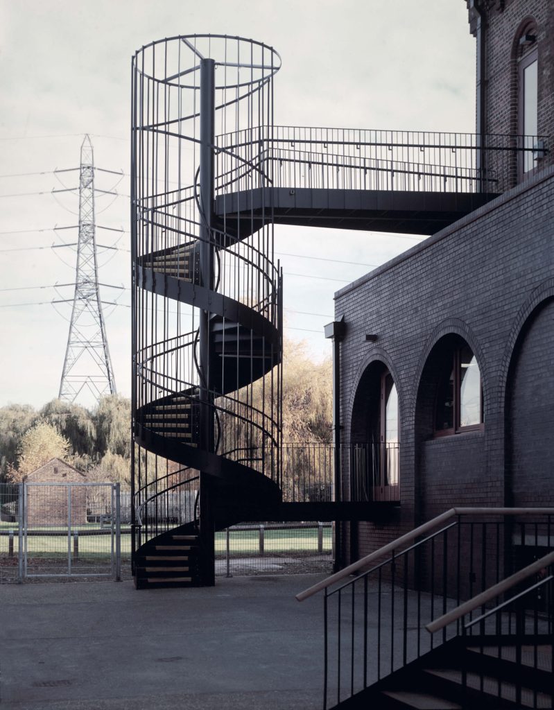 The spiral stair and kitchen extension