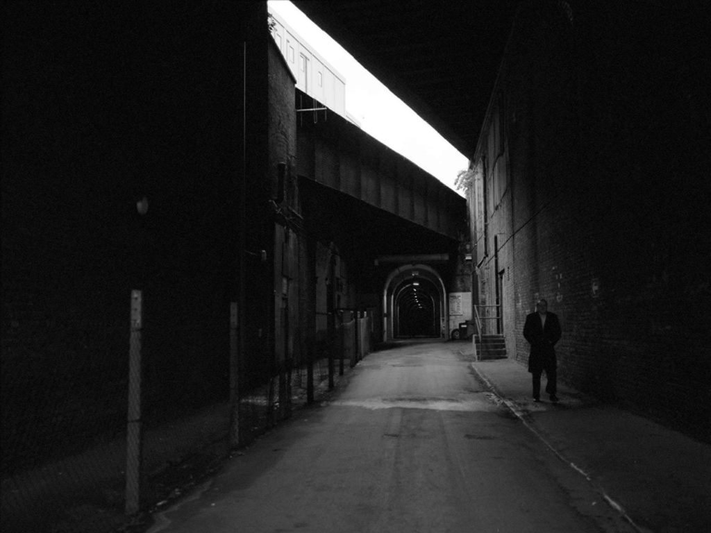 Man walking along road